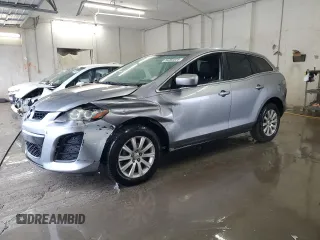 2011 Mazda CX-7 i Sport z VIN JM3ER2B50B0394884, wystawiony jako Copart lot #54360525 z przebiegiem 202 657 mil mil oraz Szkody całkowita. Historia ofert i sprzedaży dostępna na DreamBid. Obrazek 1.