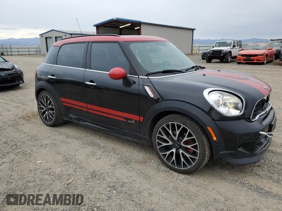 2016 MINI Countryman John Cooper Works with VIN WMWXD1C53GWS95325, listed as a Copart auction lot 77540424 with 98,951 mi miles and Salvage Title. Bid and sale history available at DreamBid. Image 4.