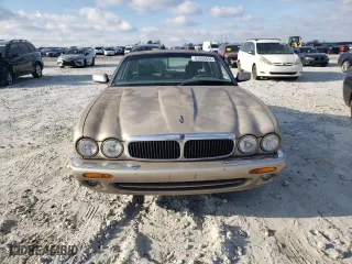 1998 Jaguar XJ with VIN SAJHX1242WC845736, listed as a Copart auction lot 82006044 with 188,785 mi miles and Salvage Title. Bid and sale history available at carsss.com. Image 5.