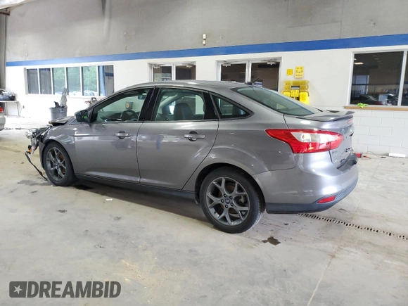 2013 Ford Focus SE with VIN 1FADP3F20DL250081, listed as a Copart auction lot 62140995 with 78,118 mi miles and Salvage title. Bid and sale history available at DreamBid. Image 2.