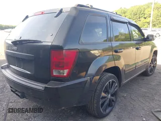 2005 Jeep Grand Cherokee Laredo z VIN 1J4GR48K65C725099, wystawiony jako IAAI lot #42509223 z przebiegiem 249 216 mil mil oraz . Historia ofert i sprzedaży dostępna na DreamBid. Obrazek 4.