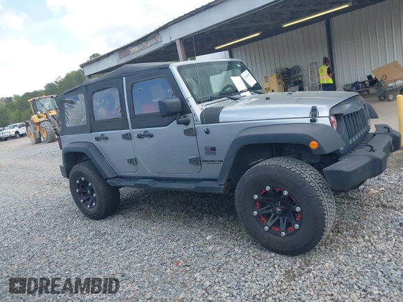 2014 Jeep Wrangler Unlimited Sport with VIN 1C4BJWDG3EL135351, listed as a IAAI auction lot 41947408 with 104,460 mi miles. Bid and sale history available at carsss.com. Image 13.