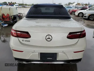 2021 Mercedes-Benz E 450 with VIN W1K1K5JB5MF164686, listed as a Copart auction lot 71977664 with 10,399 mi miles and Salvage title. Bid and sale history available at DreamBid. Image 6.