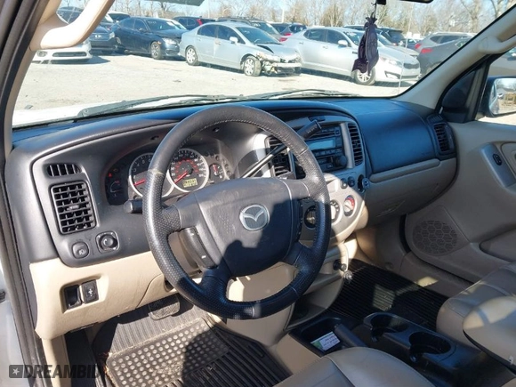 2003 Mazda Tribute ES with VIN 4F2CZ96113KM54743, listed as a IAAI auction lot 41640604 with 171,648 mi miles. Bid and sale history available at carsss.com. Image 13.
