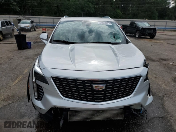 2020 Cadillac XT4 FWD Premium Luxury with VIN 1GYFZCR45LF027018, listed as a Copart auction lot 55537625 with 98,651 mi miles and Salvage title. Bid and sale history available at DreamBid. Image 5.