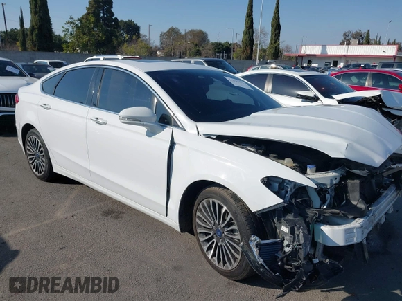 2018 Ford Fusion Titanium with VIN 3FA6P0RU0JR117158, listed as a IAAI auction lot 41435172 with 98,390 mi miles and . Bid and sale history available at DreamBid. Image 13.