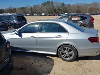 2014 Mercedes-Benz E-Class E 250 BlueTEC Luxury with VIN WDDHF0EB6EA967831, listed as a IAAI auction lot 41660612 with 187,041 mi miles. Bid and sale history available at carsss.com. Image 14.