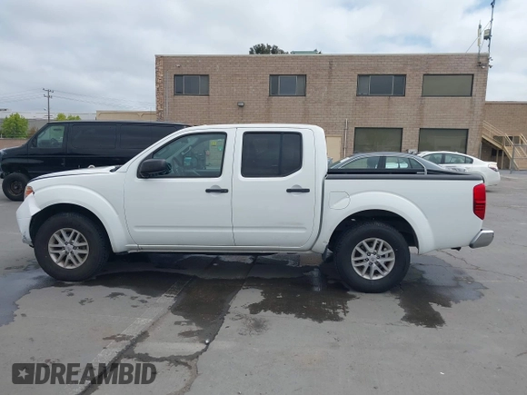 2016 Nissan Frontier SV z VIN 1N6AD0ER7GN737013, wystawiony jako IAAI lot #42106586 z przebiegiem 54 218 mil mil oraz . Historia ofert i sprzedaży dostępna na DreamBid. Obrazek 14.