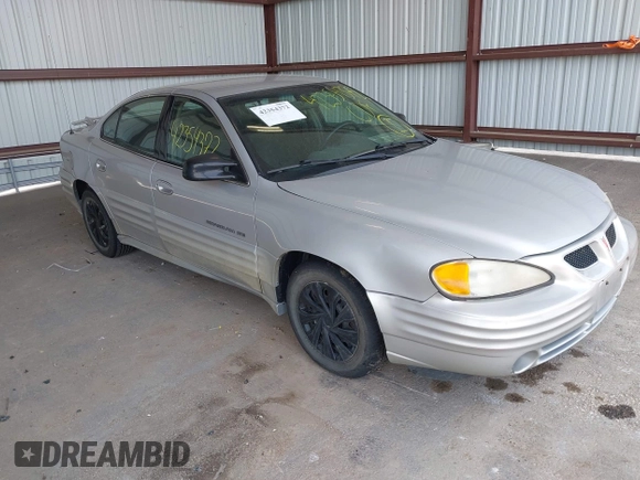 2001 Pontiac Grand Am SE with VIN 1G2NE52T81M648017, listed as a IAAI auction lot 42354372 with 206,086 mi miles and . Bid and sale history available at DreamBid. Image 1.