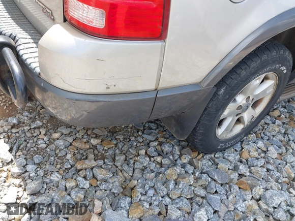 2005 Ford Explorer XLT with VIN 1FMDU73E05UA46123, listed as a IAAI auction lot 42511282 with 140,681 mi miles and . Bid and sale history available at DreamBid. Image 12.