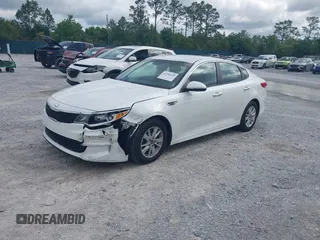 2017 Kia Optima LX z VIN 5XXGT4L32HG161091, wystawiony jako IAAI lot #42266149 z przebiegiem 166 254 mil mil oraz . Historia ofert i sprzedaży dostępna na DreamBid. Obrazek 17.