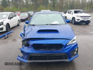 2021 Subaru WRX Premium z VIN JF1VA1C6XM9818786, wystawiony jako IAAI lot #42182203 z przebiegiem 52 535 mil mil oraz . Historia ofert i sprzedaży dostępna na DreamBid. Obrazek 18.