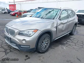 2014 BMW X1 xDrive28i with VIN WBAVL1C51EVY20556, listed as a IAAI auction lot 41699071 with 74,590 mi miles. Bid and sale history available at carsss.com. Image 17.