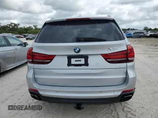 2015 BMW X5 xDrive50i with VIN 5UXKR6C51F0J74160, listed as a Copart auction lot 79337044 with 143,436 mi miles and Salvage title. Bid and sale history available at DreamBid. Image 6.