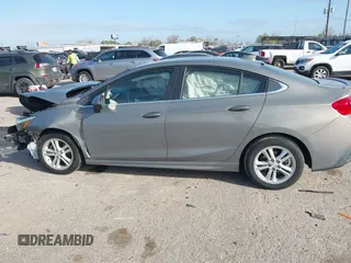 2017 Chevrolet Cruze LT with VIN 1G1BE5SM1H7165431, listed as a IAAI auction lot 41777097 with 101,321 mi miles and . Bid and sale history available at DreamBid. Image 14.