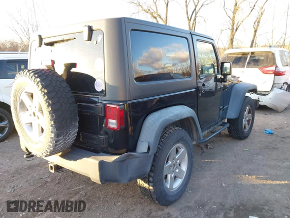 2011 Jeep Wrangler Rubicon with VIN 1J4HA6D11BL564211, listed as a IAAI auction lot 41242240 with 124,039 mi miles and . Bid and sale history available at carsss.com. Image 4.