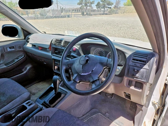 2004 Isuzu Rodeo S z VIN 4S2CK58W544313903, wystawiony jako Copart lot #57535585 z przebiegiem 121 385 mil mil oraz Tytuł czysty. Historia ofert i sprzedaży dostępna na DreamBid. Obrazek 9.