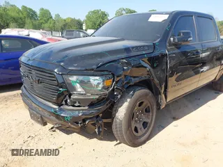 2021 Ram 1500 Big Horn z VIN 1C6RREFT1MN769814, wystawiony jako IAAI lot #42052424 z przebiegiem 71 958 mil mil oraz . Historia ofert i sprzedaży dostępna na DreamBid. Obrazek 6.