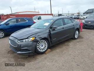 2016 Ford Fusion SE Hybrid with VIN 3FA6P0LU5GR235241, listed as a IAAI auction lot 41697504 with 165,510 mi miles. Bid and sale history available at carsss.com. Image 2.