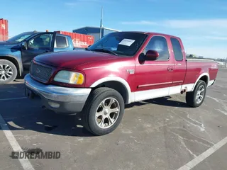 2003 Ford F-150 XL with VIN 1FTRX18L13NA55281, listed as a IAAI auction lot 41694883 with 101,777 mi miles. Bid and sale history available at carsss.com. Image 2.