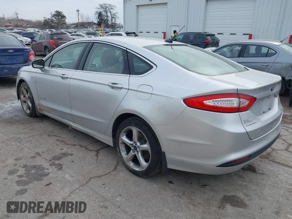 2014 Ford Fusion SE Hybrid with VIN 3FA6P0LU7ER176612, listed as a IAAI auction lot 41456075 with 101,621 mi miles and . Bid and sale history available at DreamBid. Image 3.