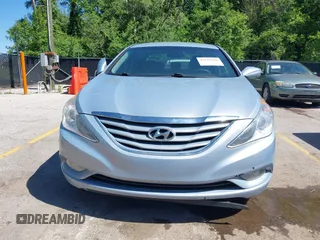 2013 Hyundai Sonata GLS z VIN 5NPEB4AC2DH594583, wystawiony jako IAAI lot #42328518 z przebiegiem 142 504 mil mil oraz . Historia ofert i sprzedaży dostępna na DreamBid. Obrazek 6.