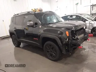 2018 Jeep Renegade Trailhawk z VIN ZACCJBCB7JPH91187, wystawiony jako IAAI lot #41984322 z przebiegiem 72 881 mil mil oraz . Historia ofert i sprzedaży dostępna na DreamBid. Obrazek 1.