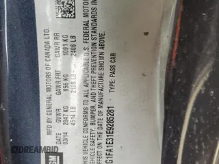 2014 Chevrolet Camaro LS z VIN 2G1FA1E31E9285281, wystawiony jako Copart lot #44851245 z przebiegiem Nie podano mil oraz Szkody całkowita. Historia ofert i sprzedaży dostępna na DreamBid. Obrazek 14.