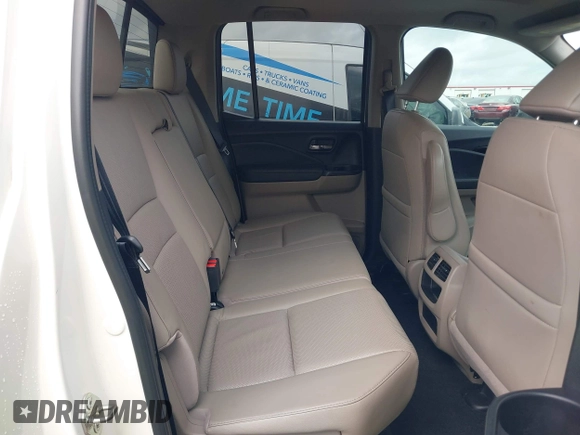 2019 Honda Ridgeline RTL-E with VIN 5FPYK3F78KB018356, listed as a IAAI auction lot 41946363 with 61,472 mi miles and . Bid and sale history available at DreamBid. Image 8.