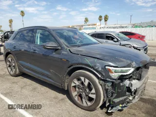 2023 Audi e-tron Premium with VIN WA1AAAGE1PB025748, listed as a Copart auction lot 70300304 with 3,798 mi miles and Salvage Title. Bid and sale history available at carsss.com. Image 4.