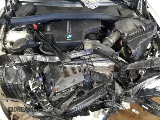 2013 BMW X1 xDrive28i z VIN WBAVL1C58DVR85843, wystawiony jako Copart lot #57589125 z przebiegiem 102 198 mil mil oraz Szkody całkowita. Historia ofert i sprzedaży dostępna na DreamBid. Obrazek 12.