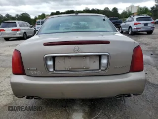 2004 Cadillac DeVille z VIN 1G6KD54Y64U134605, wystawiony jako Copart lot #56258215 z przebiegiem 256 662 mil mil oraz Szkody całkowita. Historia ofert i sprzedaży dostępna na DreamBid. Obrazek 6.