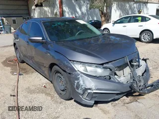 2019 Honda Civic Sedan LX with VIN 19XFC2F67KE204183, listed as a IAAI auction lot 41654678 with 107,306 mi miles. Bid and sale history available at carsss.com. Image 1.