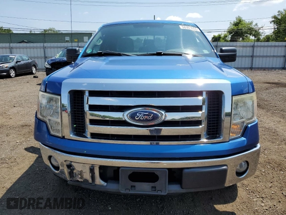 2011 Ford F-150 XL with VIN 1FTEX1CM7BFB19749, listed as a Copart auction lot 66301655 with 207,942 mi miles and Salvage title. Bid and sale history available at DreamBid. Image 5.
