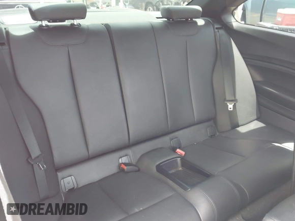2014 BMW 2 Series 228i with VIN WBA1F5C54EV256303, listed as a IAAI auction lot 42214512 with 81,116 mi miles and . Bid and sale history available at DreamBid. Image 8.