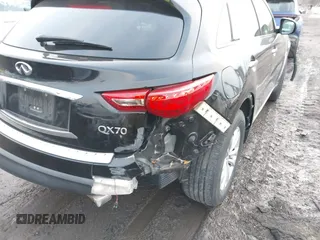 2015 Infiniti QX70 with VIN JN8CS1MW2FM480768, listed as a IAAI auction lot 41229824 with 149,146 mi miles and . Bid and sale history available at DreamBid. Image 17.