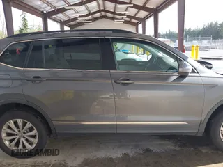 2018 Volkswagen Tiguan SEL with VIN 3VV3B7AX6JM054849, listed as a IAAI auction lot 42303112 with 87,574 mi miles and . Bid and sale history available at DreamBid. Image 13.