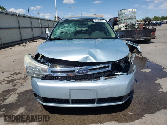 2009 Ford Focus SE z VIN 1FAHP35N49W186131, wystawiony jako Copart lot #57279205 z przebiegiem 85 285 mil mil oraz Szkoda całkowita • Salvage title. Historia ofert i sprzedaży dostępna na DreamBid. Obrazek 5.