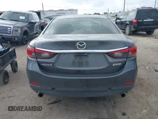2017 Mazda 6 Touring with VIN JM1GL1V57H1127804, listed as a IAAI auction lot 41515342 with 107,336 mi miles and . Bid and sale history available at carsss.com. Image 16.
