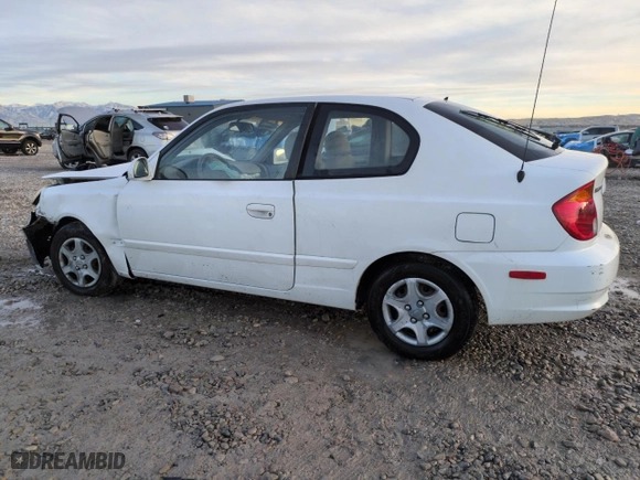 2004 Hyundai Accent GL with VIN KMHCG35C94U310459, listed as a Copart auction lot 79477194 with 86,942 mi miles and Salvage Title. Bid and sale history available at carsss.com. Image 2.