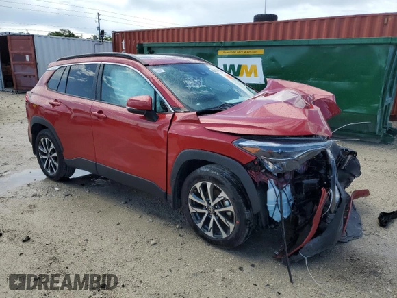2022 Toyota Corolla Cross XLE with VIN 7MUDAAAG8NV014321, listed as a Copart auction lot 62181355 with 24,550 mi miles and Non repairable. Bid and sale history available at DreamBid. Image 4.