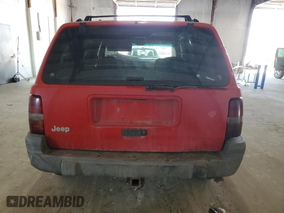 1998 Jeep Grand Cherokee Laredo с VIN 1J4GZ58S9WC368024, выставлен на аукционе Copart как лот 48304265 с пробегом Не указан миль и Списание • Salvage title. История ставок и продаж доступна на DreamBid. Изображение 6.