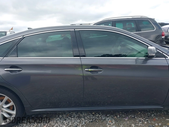2013 Toyota Avalon XLE z VIN 4T1BK1EB0DU073513, wystawiony jako IAAI lot #42364719 z przebiegiem 208 242 mil mil oraz . Historia ofert i sprzedaży dostępna na DreamBid. Obrazek 13.