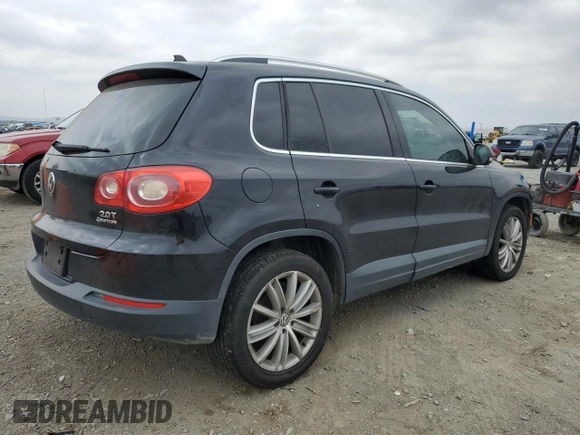 2011 Volkswagen Tiguan SE with VIN WVGBV7AX3BW551114, listed as a Copart auction lot 56016925 with 122,259 mi miles and Clean Title. Bid and sale history available at DreamBid. Image 3.