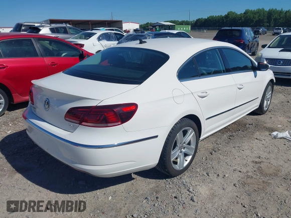 2013 Volkswagen CC Sport z VIN WVWAP7AN7DE545141, wystawiony jako IAAI lot #42325238 z przebiegiem 170 478 mil mil oraz . Historia ofert i sprzedaży dostępna na DreamBid. Obrazek 4.