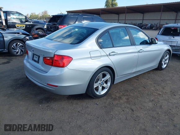 2013 BMW 3 Series 328i with VIN WBA3C1C52DF440786, listed as a IAAI auction lot 40777716 with 171,385 mi miles. Bid and sale history available at carsss.com. Image 4.