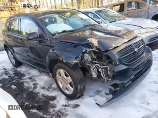 2009 Dodge Caliber SXT with VIN 1B3HB48A89D118869, listed as a IAAI auction lot 41315552 with 198,986 mi miles and . Bid and sale history available at carsss.com. Image 1.