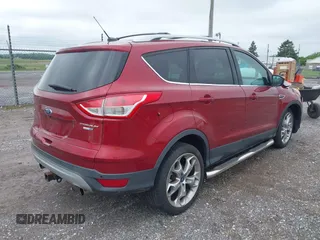 2013 Ford Escape Titanium with VIN 1FMCU9J94DUC07522, listed as a IAAI auction lot 42365124 with 61,168 mi miles and . Bid and sale history available at DreamBid. Image 4.
