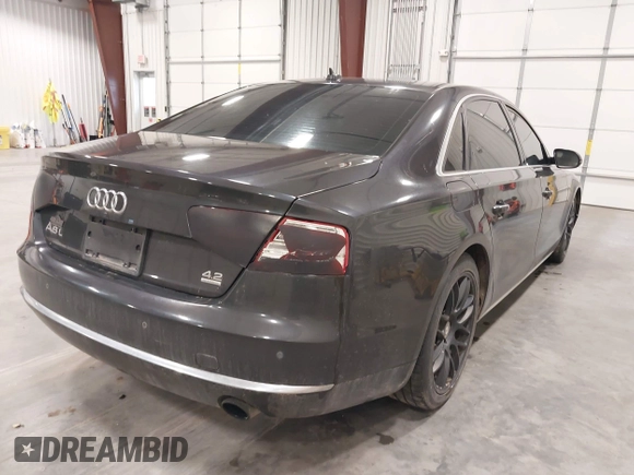2011 Audi A8 with VIN WAURVAFD1BN016929, listed as a IAAI auction lot 42144918 with 171,874 mi miles and . Bid and sale history available at DreamBid. Image 4.