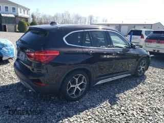 2016 BMW X1 xDrive28i z VIN WBXHT3C3XGP888701, wystawiony jako Copart lot #51409205 z przebiegiem 94 713 mil mil oraz Szkoda całkowita • Salvage title. Historia ofert i sprzedaży dostępna na DreamBid. Obrazek 3.